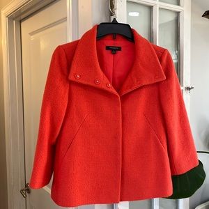 Cropped jacket, 3/4 sleeves. Bright red/orange pop of color. Great condition